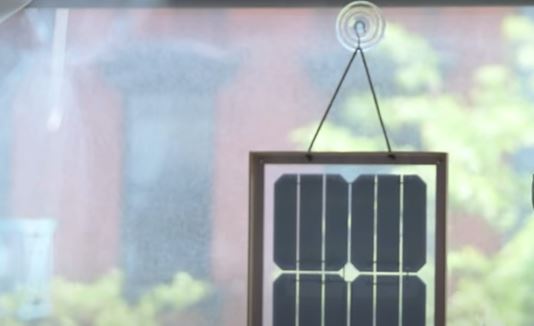 can you charge a solar panel through a window