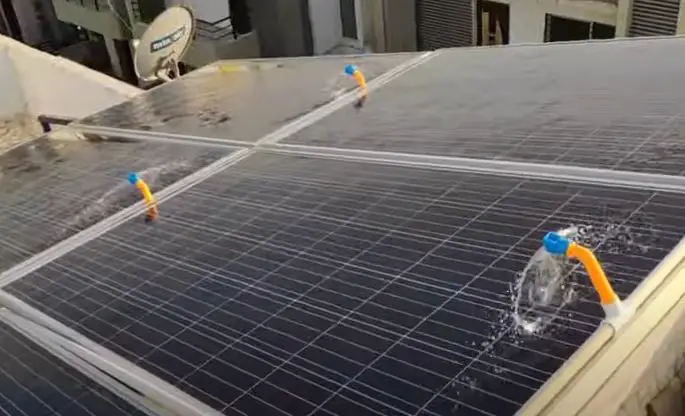 how to clean solar panels on roof automatically