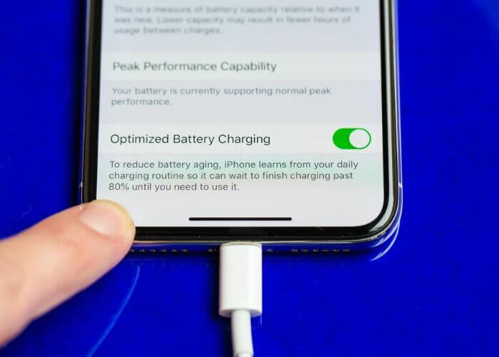 iphone 12 battery going down while charging